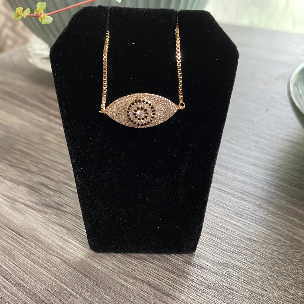 Evil Eye Bracelet Adjustable Black and Clear Rhinestone Gold colored Bracelet